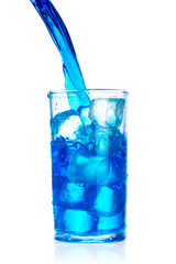 pouring blue water splash into glass isolated on white background with clipping path