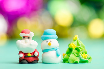 Santa claus,snowman and pine tree doll in Christmass day
