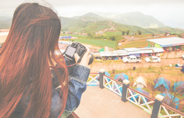 Female photographer Viewing phetchabun attractions in thailand