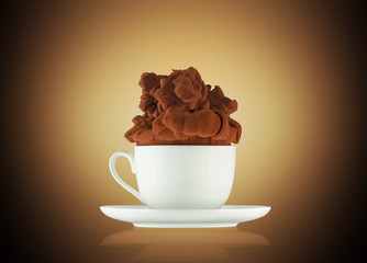 cloud of hot chocolate coming out from a cup