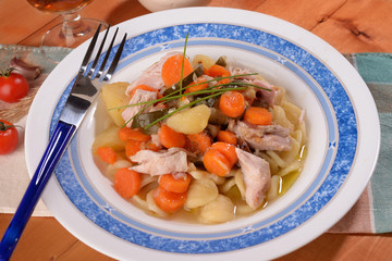 Orecchiette with potatoes carrots and bits of chicken
