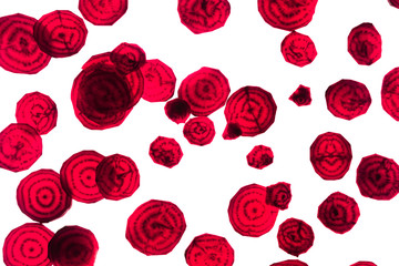 Fresh slices red beet. Decorative art. Food background.