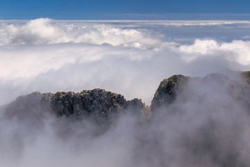 Mountain pass in clouds