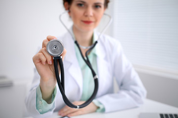 Doctor with a stethoscope in the hands