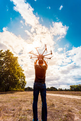 The process of setting up a copter before flight. The man makes all the necessary adjustments...