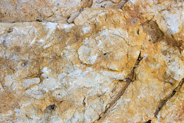 Tuff is a vulcanic stone.  close-up background texture