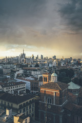 Milano, 2016 panoramic skyline with Italian Alps on Background
