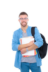A male student with a school bag holding books isolated on white background