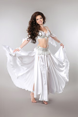 Naklejka premium Belly dance. Bellydancer. Beautiful brunette Gorgeous Arabian Wo