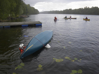 Practising to turn the canoe near shore, Kermanvirta Heinavesi Finland September 2011