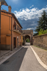 Fototapeta na wymiar Norcia, Italy. One of the streets and city gates