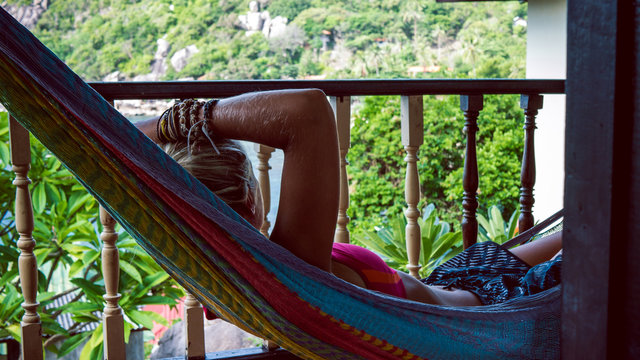 Young Woman in Hammlock, Tanote Bay, Koh Tao, Thailand