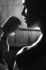 sensual woman with microphone