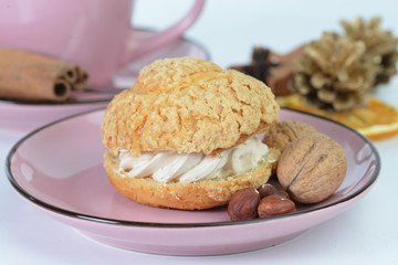close-up of tasty cake shu on the background a cup of coffee