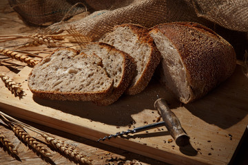 Rustic handmade bread on a wooden table 
