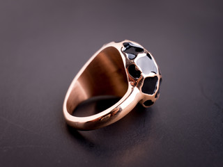 Jewel gemstone ring on black blackground