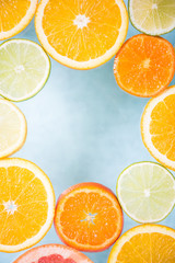Citrus fruits frame background