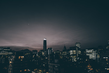 Fototapeta na wymiar Cityscape of Santiago de Chile at dawn. Blue hour at Santiago de Chile. Skyline of Santiago at night