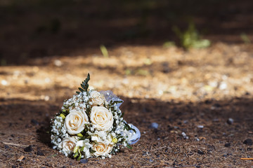 Wedding bouquet on the pavement.
