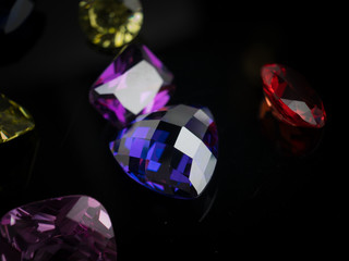 Jewel or gems on black shine color, Collection of many different natural gemstones 
amethyst,...