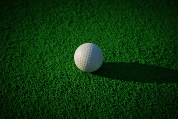 Golf ball on Artificial Grass vignetted