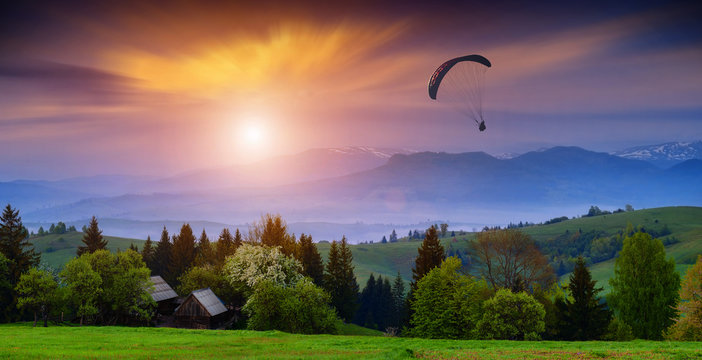 Paraglide in a carpathian sky