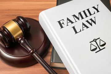 Family law book and gavel. Consumer protection book and gavel. Law and regulations concept.