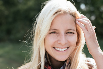 Naklejka premium Outdoor portrait of a blonde woman 