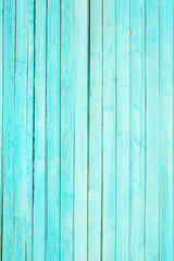 Fototapeta premium Green texture of old paint on wood planks