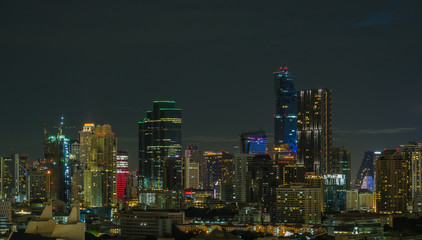 Fototapeta na wymiar Buildings in downtown city at night.
