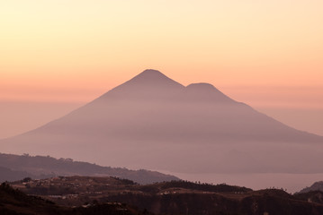 The volcanoes shilouetted against the evening sky. Guatemala