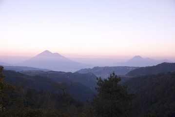 The volcanoes shilouetted against the evening sky. Guatemala