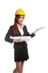 Asian engineer woman with blueprints show her palm hand.