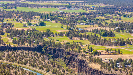 View from above of houses in rural areas. Smith Rock state park, Oregon