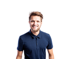 Obraz premium Hipster man in blue t-shirt, studio shot, isolated
