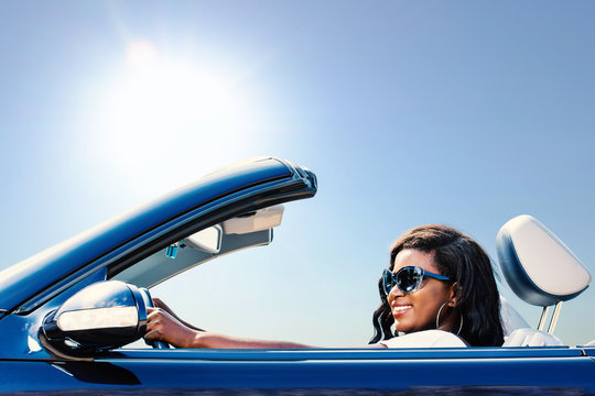 Black Girl Enjoying Drive With Convertible.