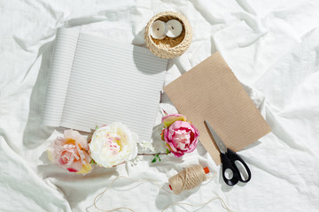  flowers with empty vintage notebook for your design