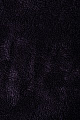 Texture of black fluffy blanket