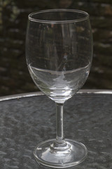 wine glass on glass table