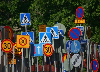 Lots of traffic signs in chaotic order in Finland.
