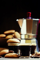 Espresso coffee, amaretti biscuits with almonds, neapolitan coff