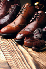 leather shoes brogues with shoe maintenance set.Selective focus
