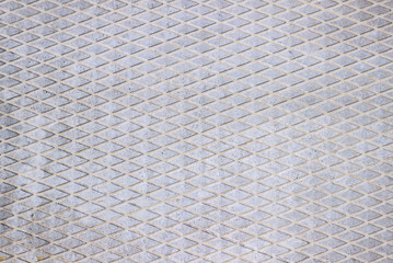 Background road slabs, rough texture, light grey color.