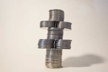 silver coins stacked isolated on a white background