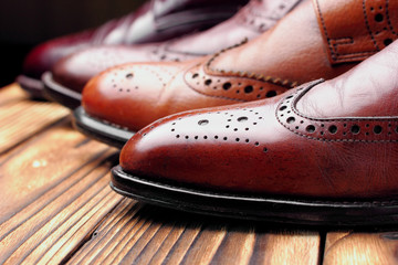Fashion classical polished men's shades of brown oxford brogues.Selective focus