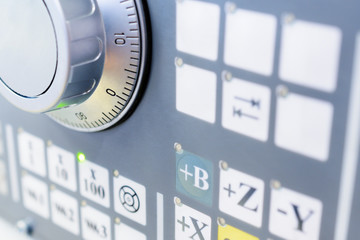 Detail of CNC machine control panel.