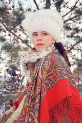beautiful girl with a horse in the Siberian winter season