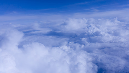 Naklejka na ściany i meble Sky clouds. Over the Clouds. Cloudscape. Blue sky and white cl