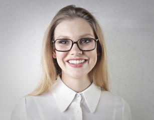 Smiling girl wearing glasses