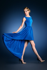 Naklejka premium walking blonde woman